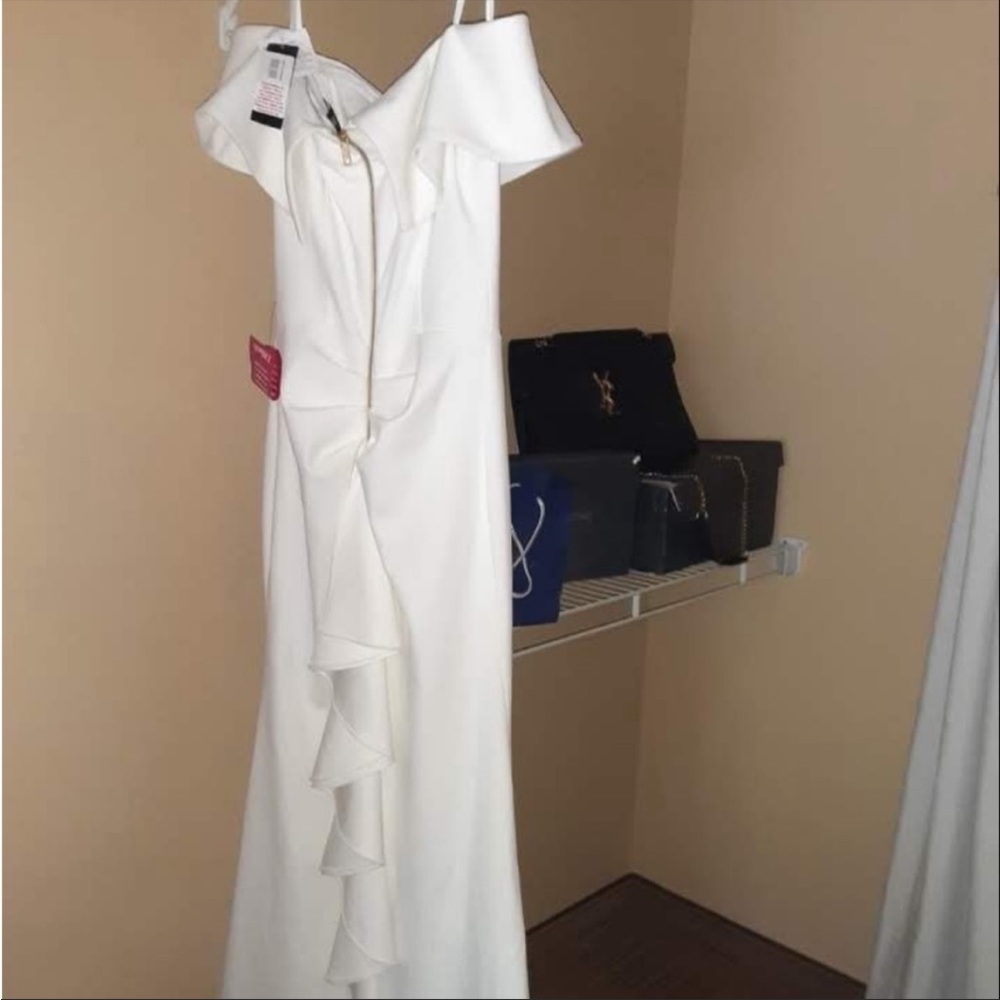 Beautiful slit off the shoulder white dress bought it new, never worn